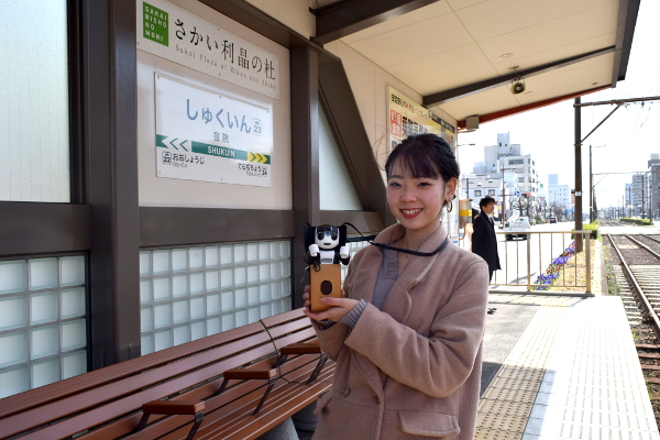 RoBoHoN in Shukuin tram station